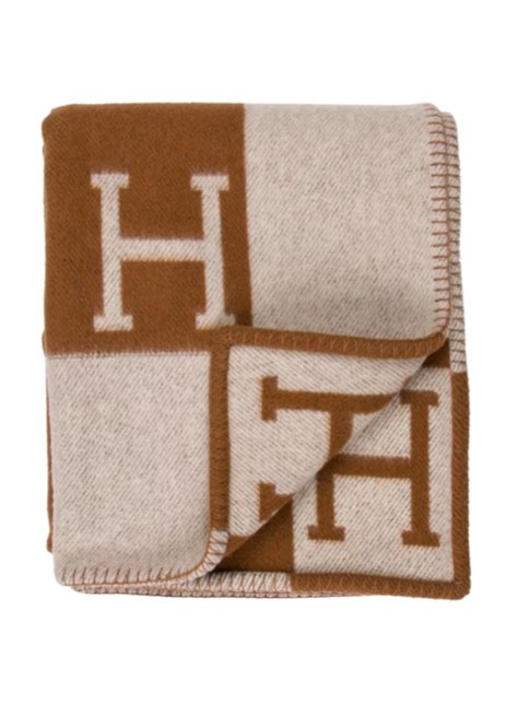 blanket with letter h.